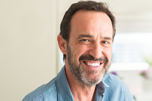 Happy older adult Older male adult smiling and happy