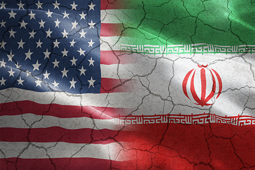 Cracked Flag of United States of America against Iran - indicates partnership, agreement, relationship, military and conflict between these two countries Graphic of US and Iranian Flags