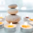 Candles and stacked stones