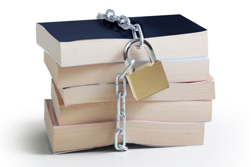 Stack of books witha padlock on top