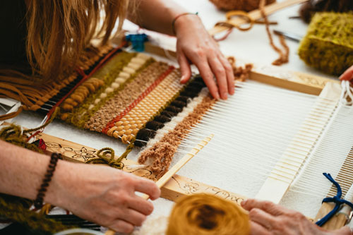 Women working on a loom