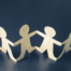 Cutout of people holding hands