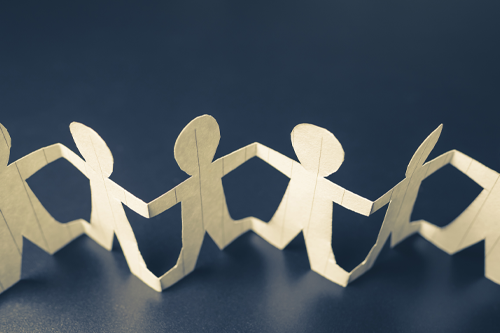 Cutout of people holding hands