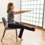 Woman doing yoga in a chair