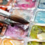 Set of watercolor paints and paintbrushes for painting