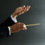 Conductor's hands and baton