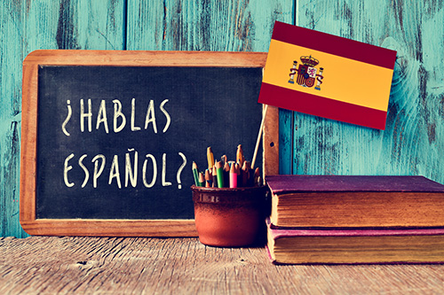 Sign on a chalk board in spanish